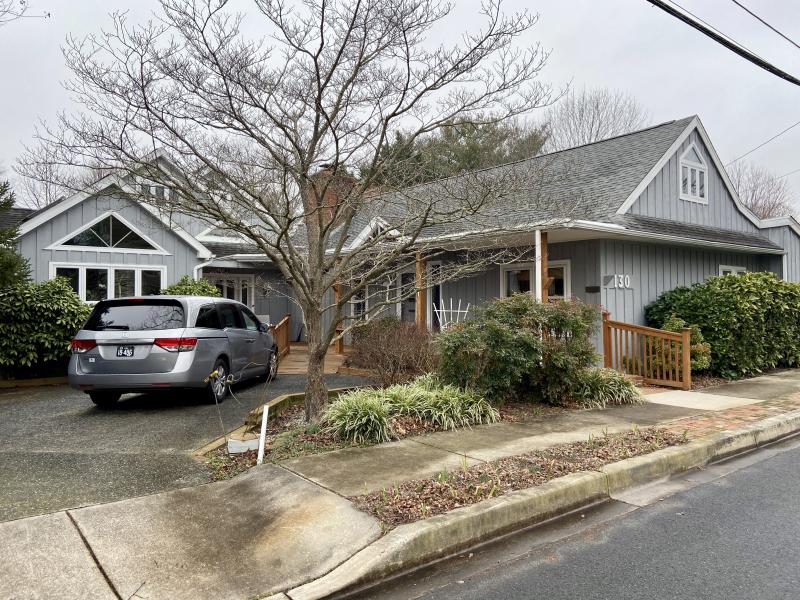 The original brush factory sits directly on McFee Street; the back addition is living space.